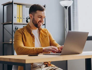 Guy On Computer Using Health Rocket